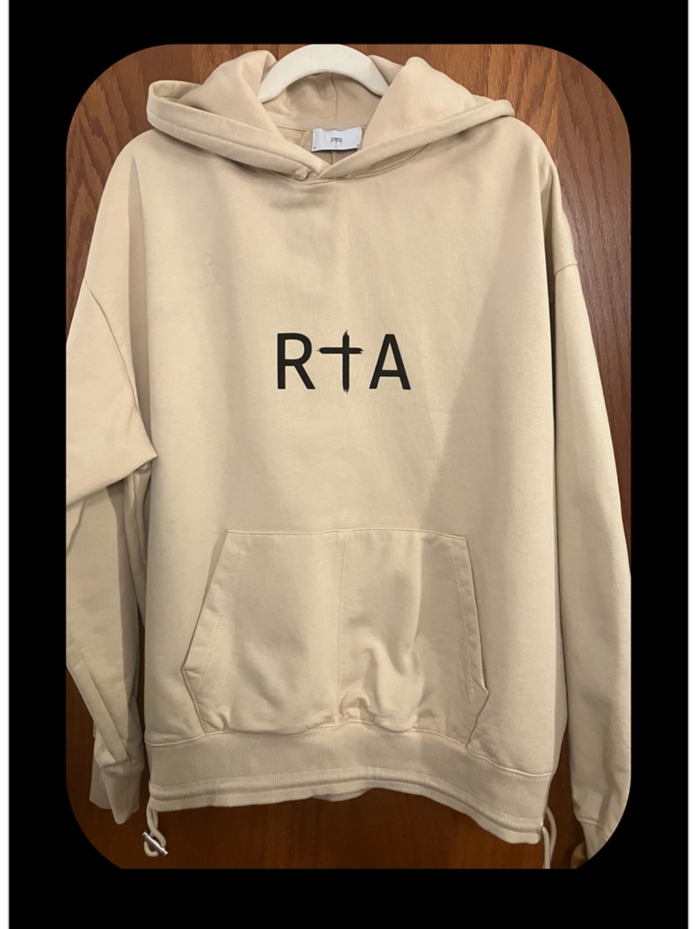 RtA, white pepper color oversized Hoodie, with classic centered, Black RtA Logo.